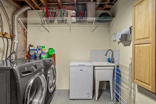 108 Glacier Drive, Banff, AB - Indoor Photo Showing Laundry Room