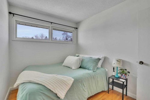36 Malibou Road Sw, Calgary, AB - Indoor Photo Showing Bedroom