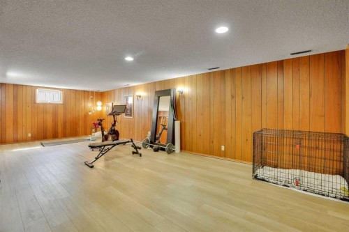 36 Malibou Road Sw, Calgary, AB - Indoor Photo Showing Gym Room