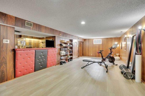 36 Malibou Road Sw, Calgary, AB - Indoor Photo Showing Gym Room