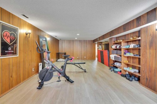 36 Malibou Road Sw, Calgary, AB - Indoor Photo Showing Gym Room
