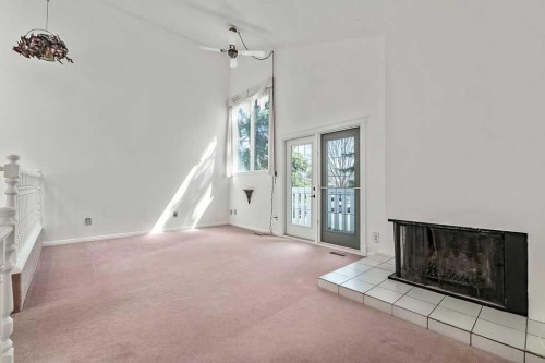 5 Stimson Road Sw, High River, AB - Indoor With Fireplace