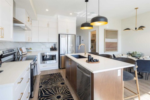 113 Wild Rose Way Se, Calgary, AB - Indoor Photo Showing Kitchen With Stainless Steel Kitchen With Upgraded Kitchen