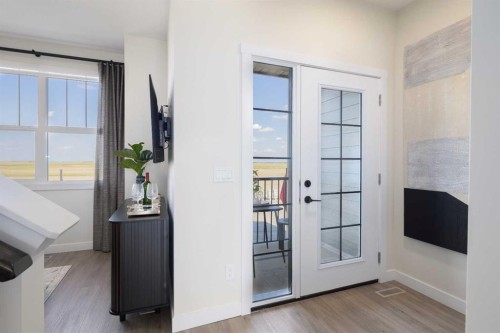 113 Wild Rose Way Se, Calgary, AB - Indoor Photo Showing Other Room