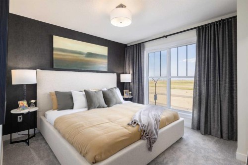 113 Wild Rose Way Se, Calgary, AB - Indoor Photo Showing Bedroom