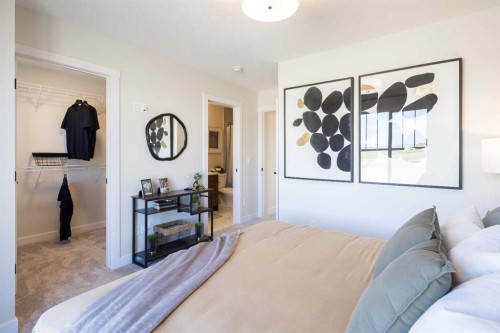 113 Wild Rose Way Se, Calgary, AB - Indoor Photo Showing Bedroom