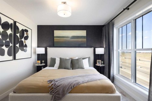 113 Wild Rose Way Se, Calgary, AB - Indoor Photo Showing Bedroom