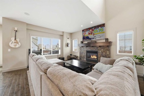 85 Mahogany Square Se, Calgary, AB - Indoor Photo Showing Living Room With Fireplace