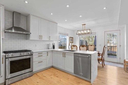 72 Crystalridge Crescent, Okotoks, AB - Indoor Photo Showing Kitchen With Upgraded Kitchen