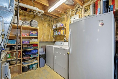 64 Erin Ridge Road Se, Calgary, AB - Indoor Photo Showing Laundry Room