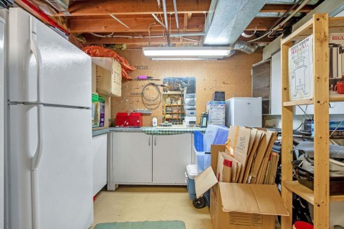 64 Erin Ridge Road Se, Calgary, AB - Indoor Photo Showing Basement