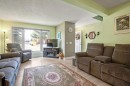 64 Erin Ridge Road Se, Calgary, AB  - Indoor Photo Showing Living Room 