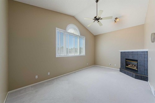 12 Hampstead Gardens Nw, Calgary, AB - Indoor With Fireplace