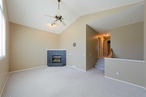 12 Hampstead Gardens Nw, Calgary, AB - Indoor With Fireplace