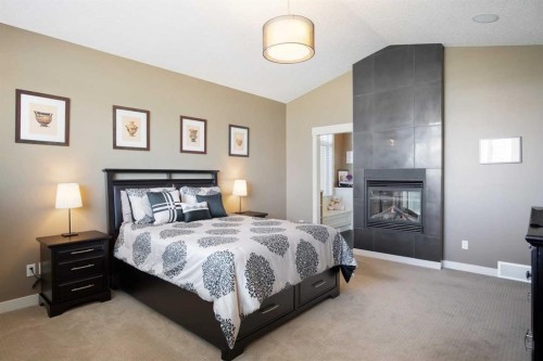 44 Aspen Summit Drive Sw, Calgary, AB - Indoor Photo Showing Bedroom