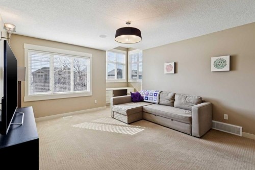 44 Aspen Summit Drive Sw, Calgary, AB - Indoor Photo Showing Living Room