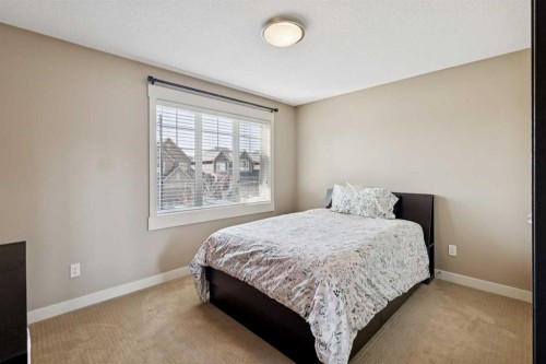 44 Aspen Summit Drive Sw, Calgary, AB - Indoor Photo Showing Bedroom