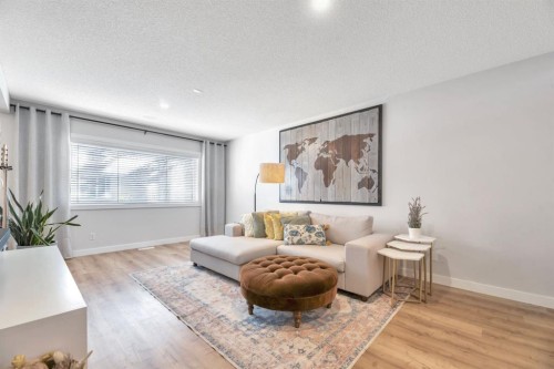 75 Copperfield Rise Se, Calgary, AB - Indoor Photo Showing Living Room