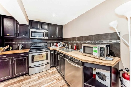 2508 Morley Trail Nw, Calgary, AB - Indoor Photo Showing Kitchen With Stainless Steel Kitchen With Double Sink