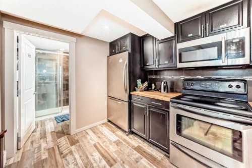 2508 Morley Trail Nw, Calgary, AB - Indoor Photo Showing Kitchen With Stainless Steel Kitchen