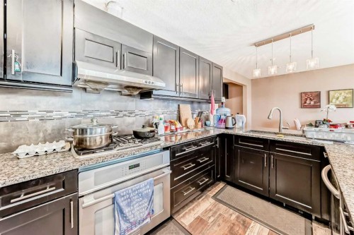 2508 Morley Trail Nw, Calgary, AB - Indoor Photo Showing Kitchen With Upgraded Kitchen