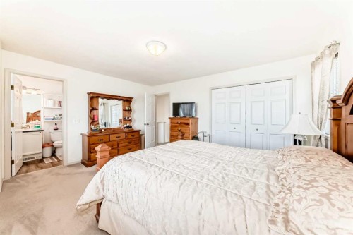 198 Copperfield Gardens Se, Calgary, AB - Indoor Photo Showing Bedroom