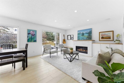 40 Tuscany Ridge Green Nw, Calgary, AB - Indoor Photo Showing Living Room With Fireplace