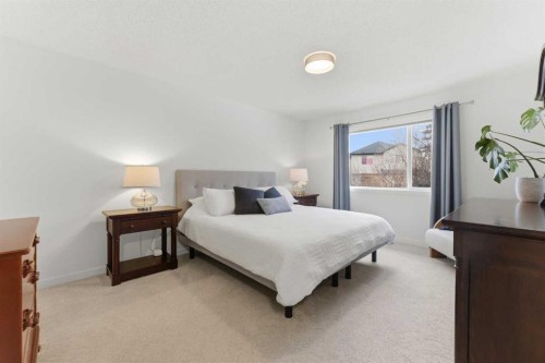 40 Tuscany Ridge Green Nw, Calgary, AB - Indoor Photo Showing Bedroom