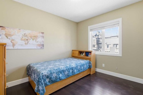 1441 Windstone Road Sw, Airdrie, AB - Indoor Photo Showing Bedroom