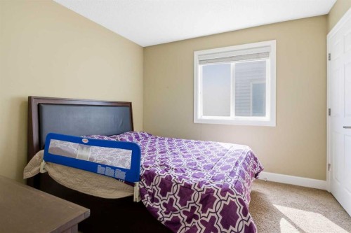 1441 Windstone Road Sw, Airdrie, AB - Indoor Photo Showing Bedroom