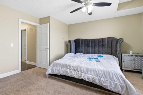 1441 Windstone Road Sw, Airdrie, AB - Indoor Photo Showing Bedroom