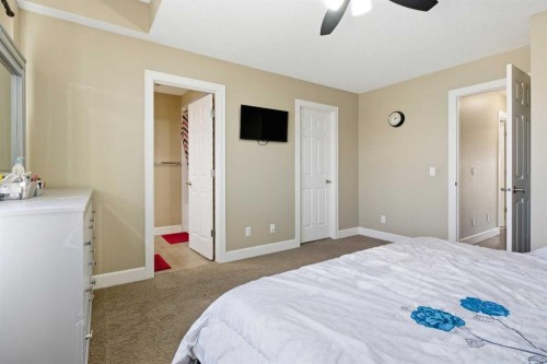 1441 Windstone Road Sw, Airdrie, AB - Indoor Photo Showing Bedroom