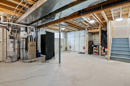 1441 Windstone Road Sw, Airdrie, AB - Indoor Photo Showing Basement