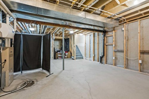 1441 Windstone Road Sw, Airdrie, AB - Indoor Photo Showing Basement