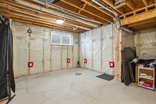1441 Windstone Road Sw, Airdrie, AB - Indoor Photo Showing Basement