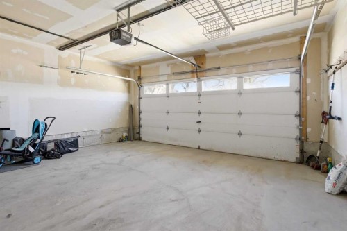 1441 Windstone Road Sw, Airdrie, AB - Indoor Photo Showing Garage