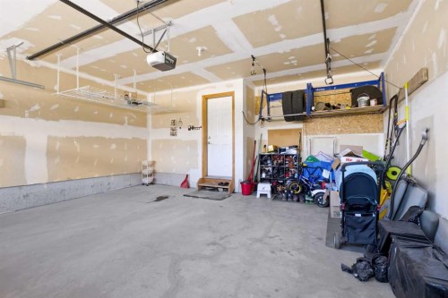 1441 Windstone Road Sw, Airdrie, AB - Indoor Photo Showing Garage