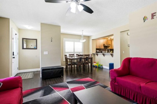 1441 Windstone Road Sw, Airdrie, AB - Indoor Photo Showing Living Room