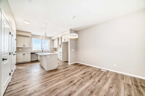 1098 Sawgrass Link Nw, Airdrie, AB - Indoor Photo Showing Kitchen With Upgraded Kitchen