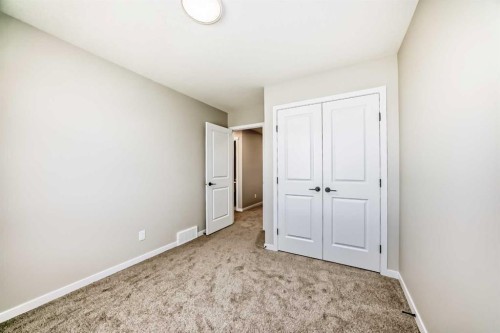 1098 Sawgrass Link Nw, Airdrie, AB - Indoor Photo Showing Other Room