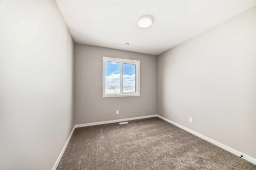 1098 Sawgrass Link Nw, Airdrie, AB - Indoor Photo Showing Other Room