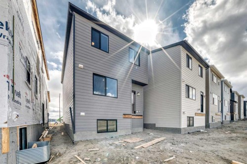 1098 Sawgrass Link Nw, Airdrie, AB - Outdoor With Exterior