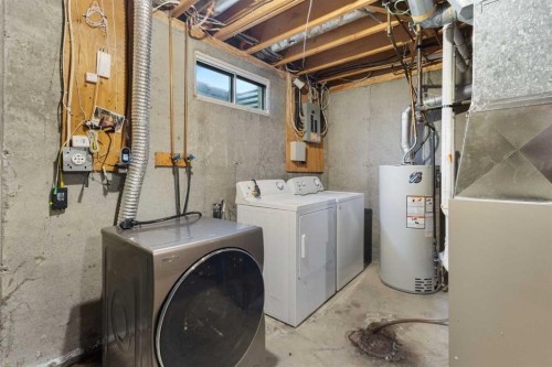 355 Georgian Villas, Calgary, AB - Indoor Photo Showing Laundry Room