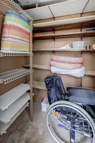 101-6800 Hunterview Drive Nw, Calgary, AB - Indoor With Storage