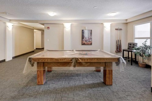 101-6800 Hunterview Drive Nw, Calgary, AB - Indoor Photo Showing Other Room