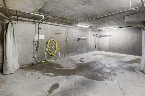 101-6800 Hunterview Drive Nw, Calgary, AB - Indoor Photo Showing Garage