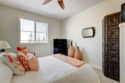 55 Tucker Circle, Okotoks, AB - Indoor Photo Showing Bedroom