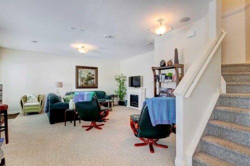 55 Tucker Circle, Okotoks, AB - Indoor Photo Showing Other Room