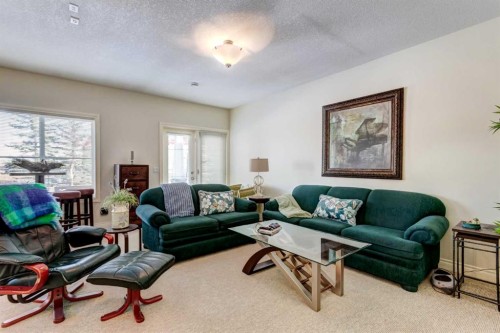 55 Tucker Circle, Okotoks, AB - Indoor Photo Showing Living Room