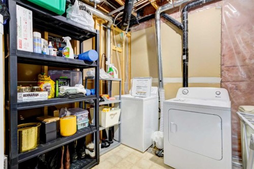 55 Tucker Circle, Okotoks, AB - Indoor Photo Showing Laundry Room